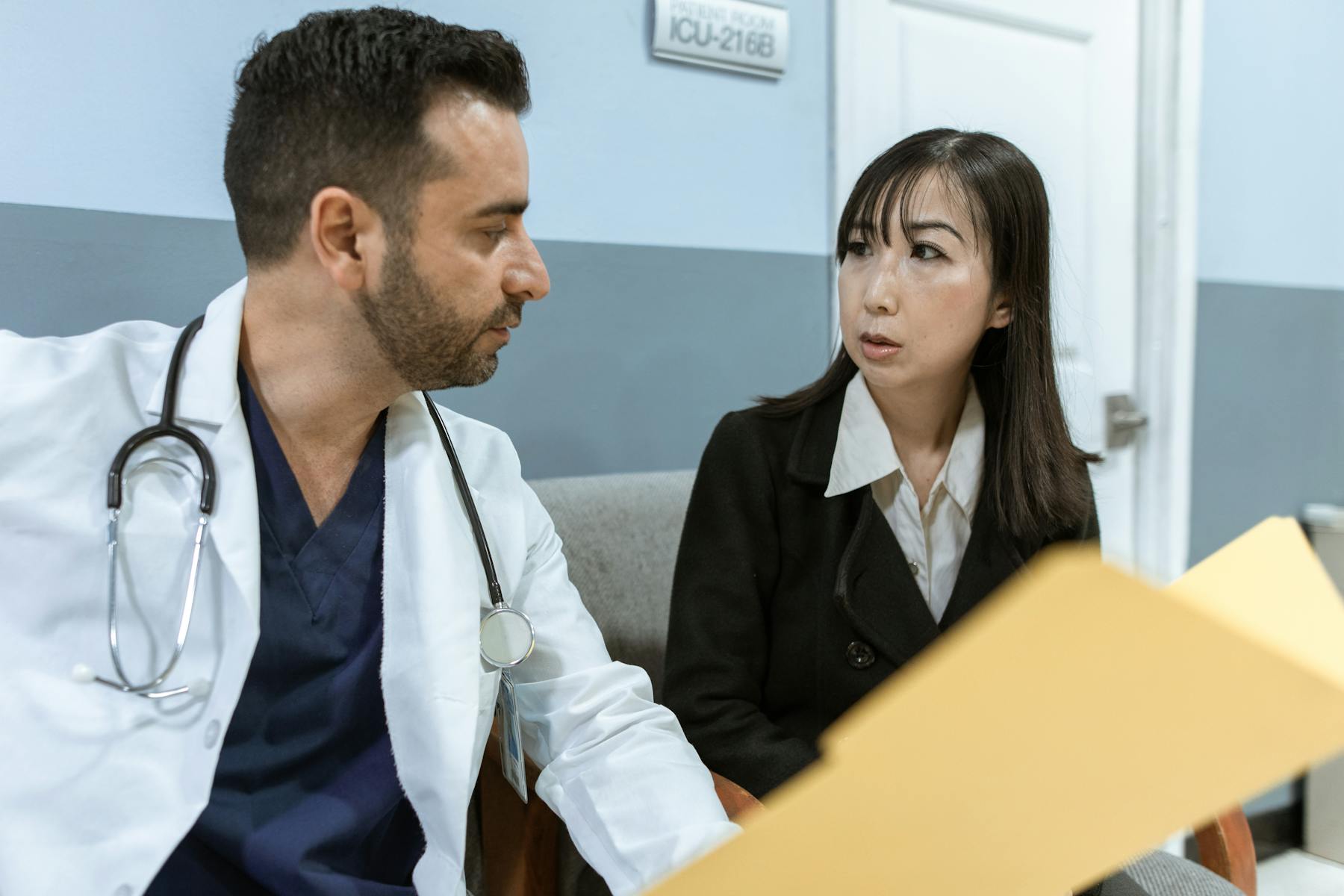 Primary care physician discussing care options with a patient